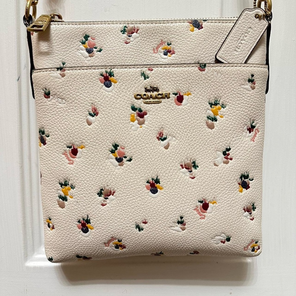 COACH authentic crossbody purse with floral details